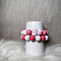 Survivor pink ribbon and white bead awareness bracelet set - front view