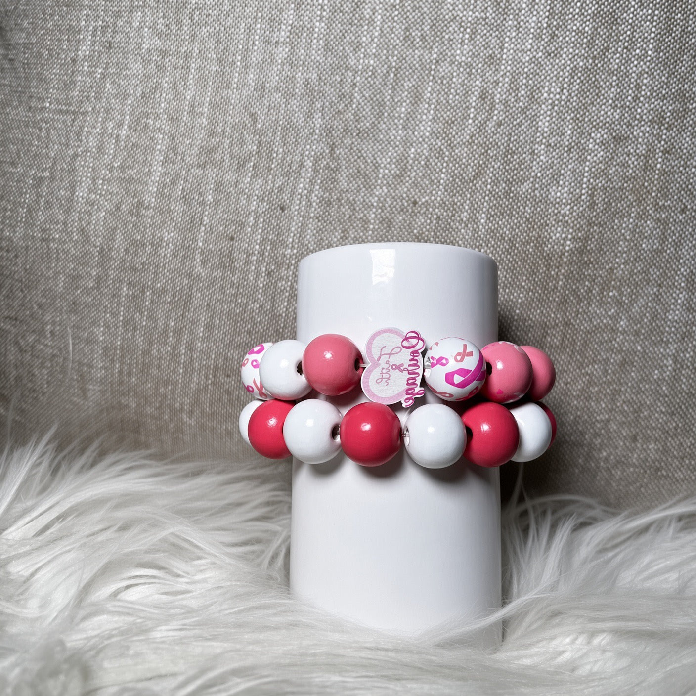 Survivor pink ribbon and white bead awareness bracelet set - front view