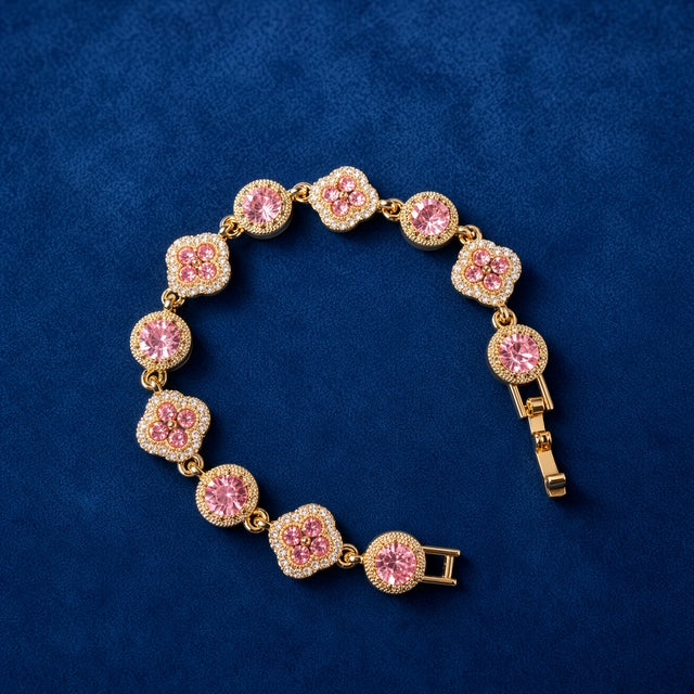 Pink Clover Crystal Bracelet on blue velvet background