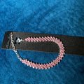 Pink Rhinestone Tennis Bracelet on black jewelry card