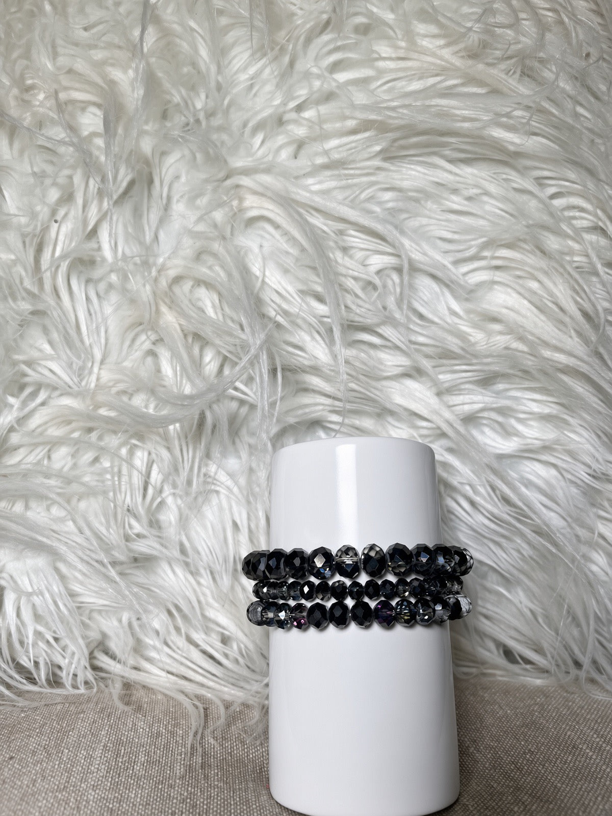 Black and gunmetal crystal rondelle bracelet set - front view