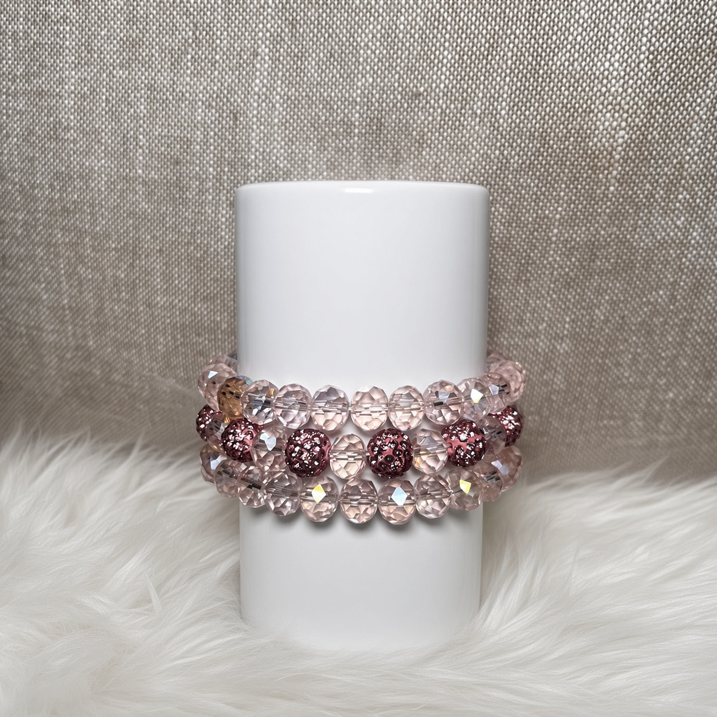 Blush pink crystal rondelle and mauve glitter pave bracelet set - front view
