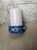 Ocean blue speckled and marbled bead bracelet set - front view