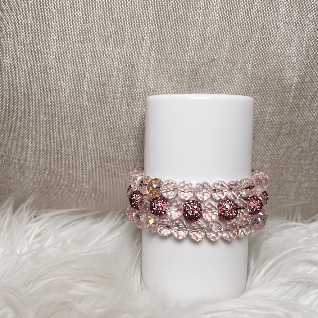 Blush pink crystal rondelle and mauve glitter pave bracelet set - side view