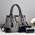 Black and white leopard print handbag with matching black wallet and card case