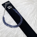 Blue Rhinestone Tennis Bracelet on black jewelry card against white fur